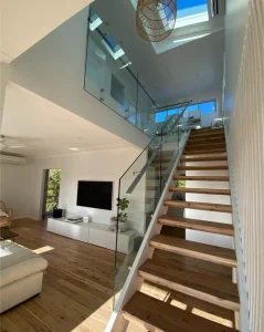 Interior View of Home With Stairs and Glass Railing