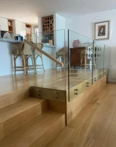 Interior View of a Home with Staircase and Frameless Glass Balustrade