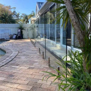 Poolside Patio with Glass Fence